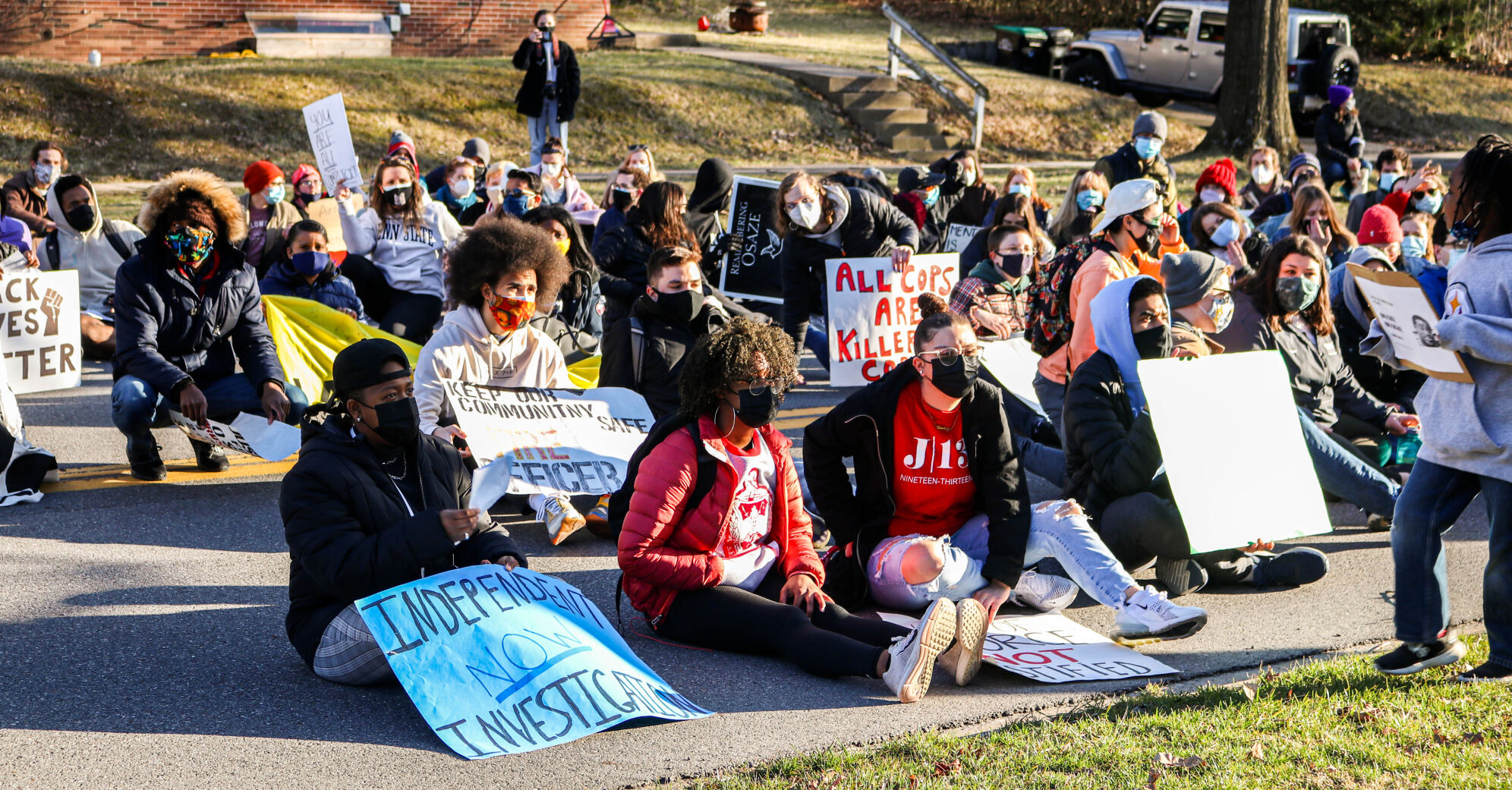 3/20 March; Two Years Too Late, protestors